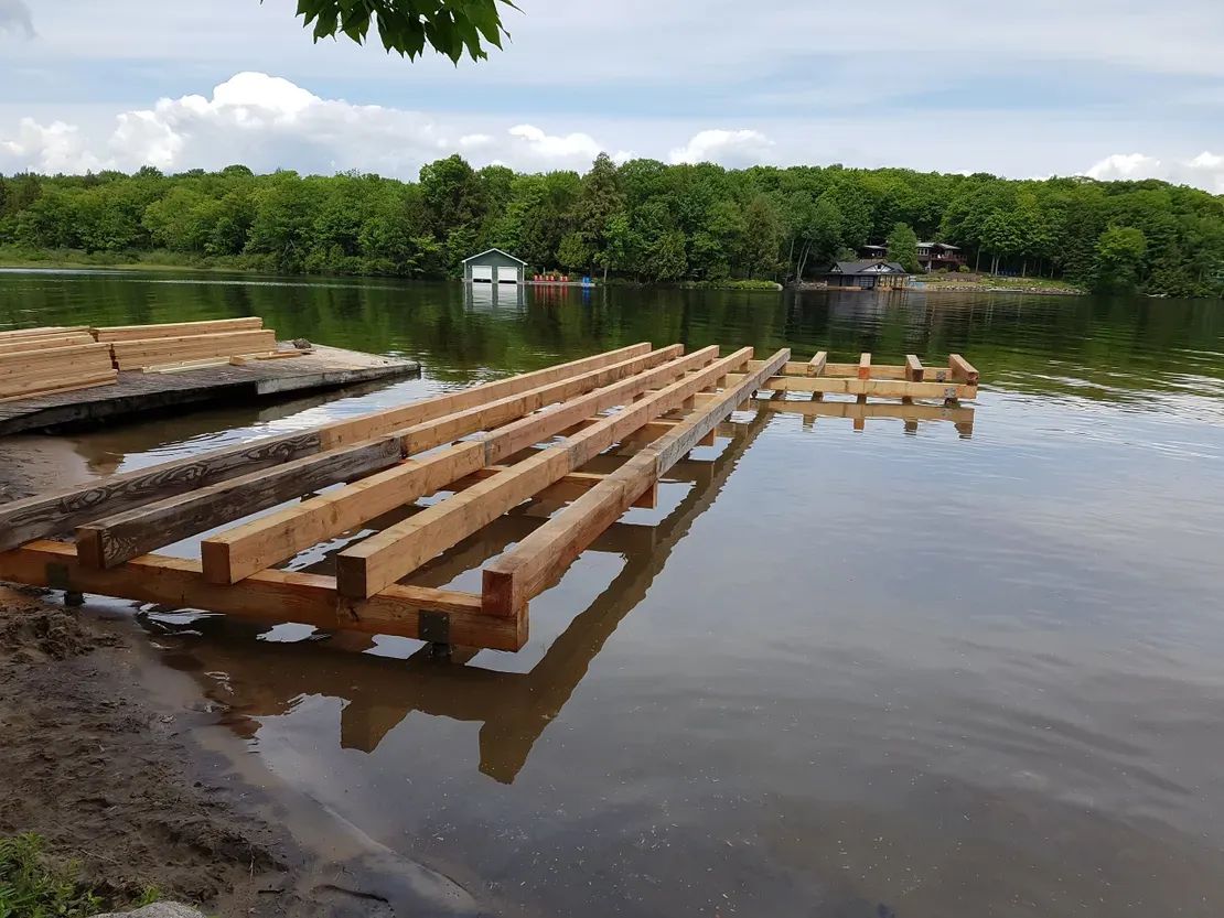 Partially built dock over water