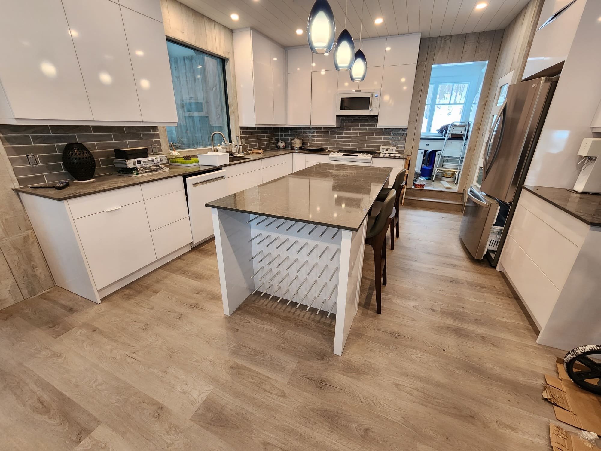 Modern kitchen with island and pendant lights
